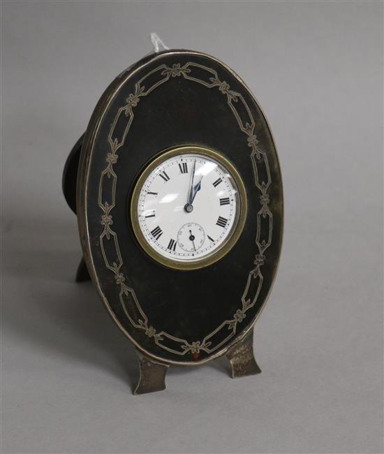 A George V tortoiseshell and silver pique mounted timepiece, S.W. Goode & Co, Birmingham, 1921, 12.3cm.